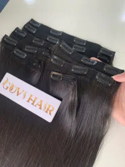 Clip in hair extensions natural color made from Vietnamese hair