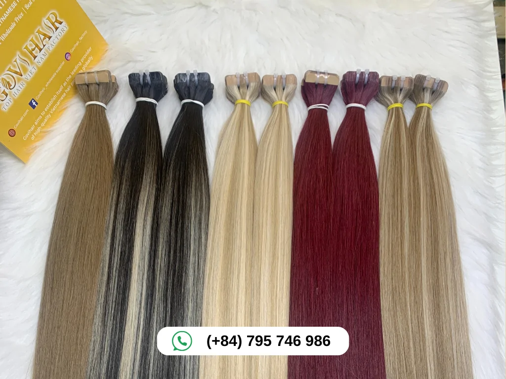 Neatly arranged tape-in hair extensions with diverse colors