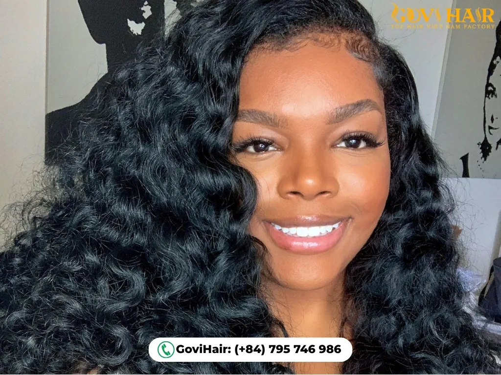 Loose curly weave with large relaxed spirals and loose