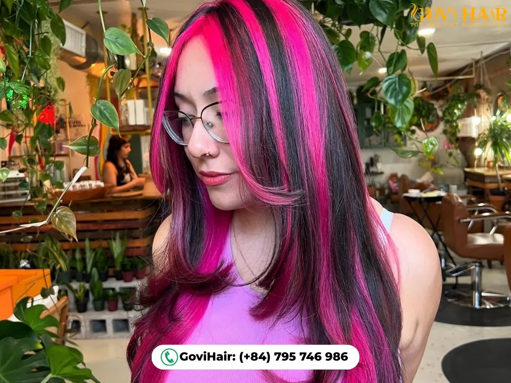 Bold electric pink two-tone hair
