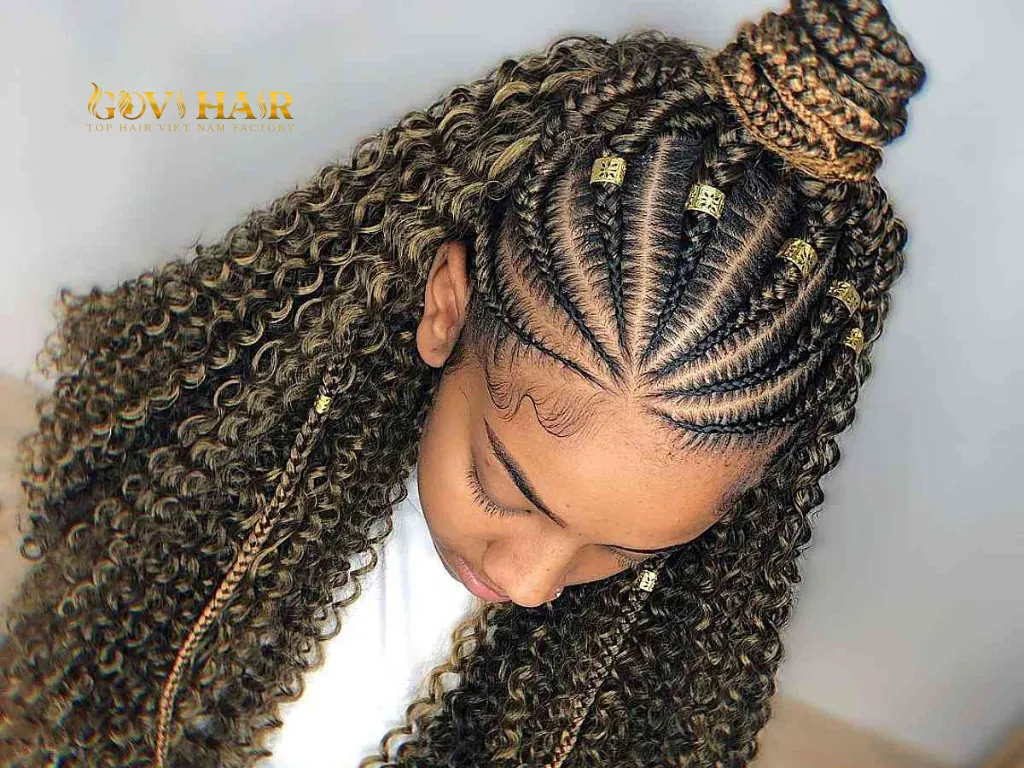 Jumbo Fulani Braids with Weave uses thick weave sections for a bold, modern update.