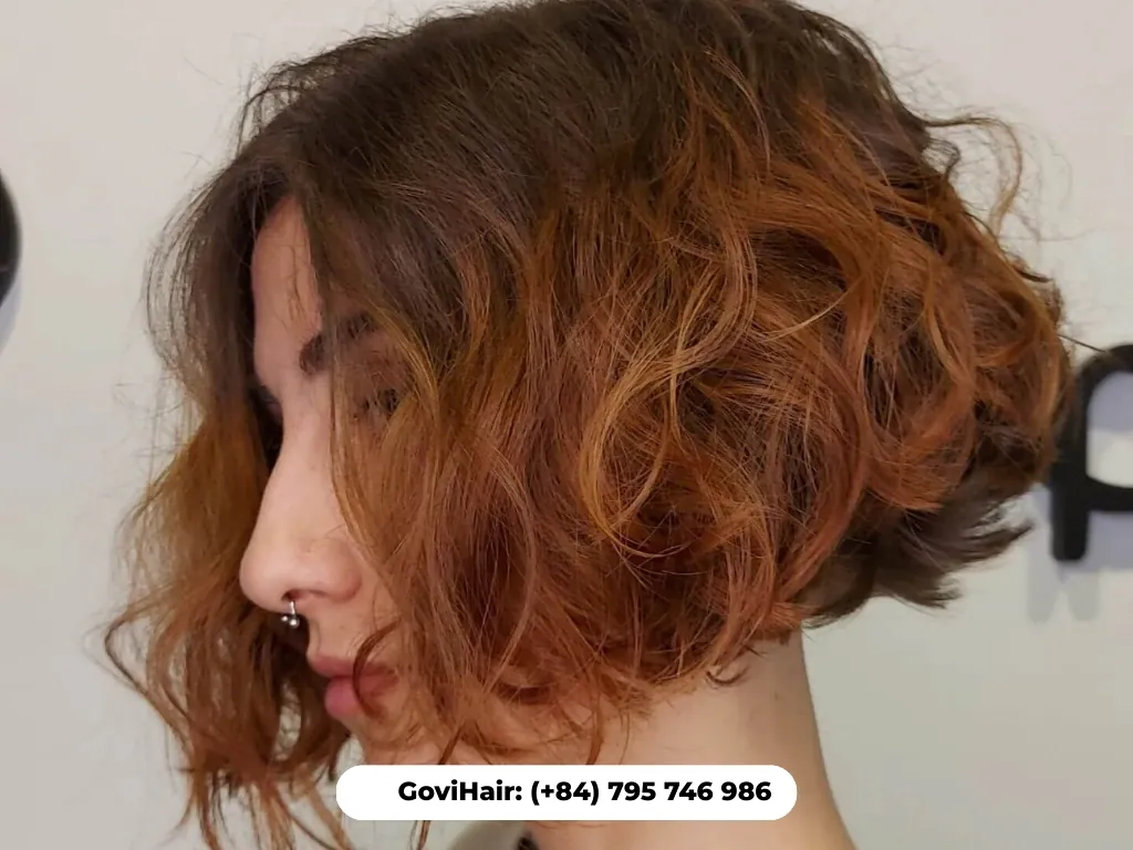 Cropped bob weave with bouncy curls