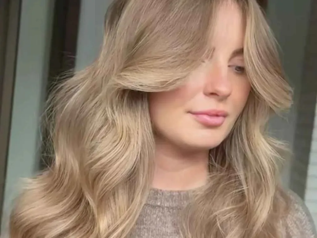 Golden beige blonde hair with radiant glow