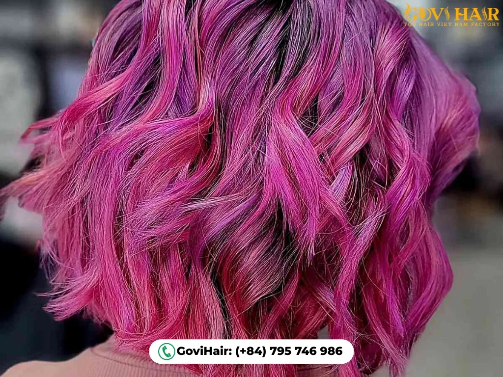 Modern bob with vibrant fuchsia accents