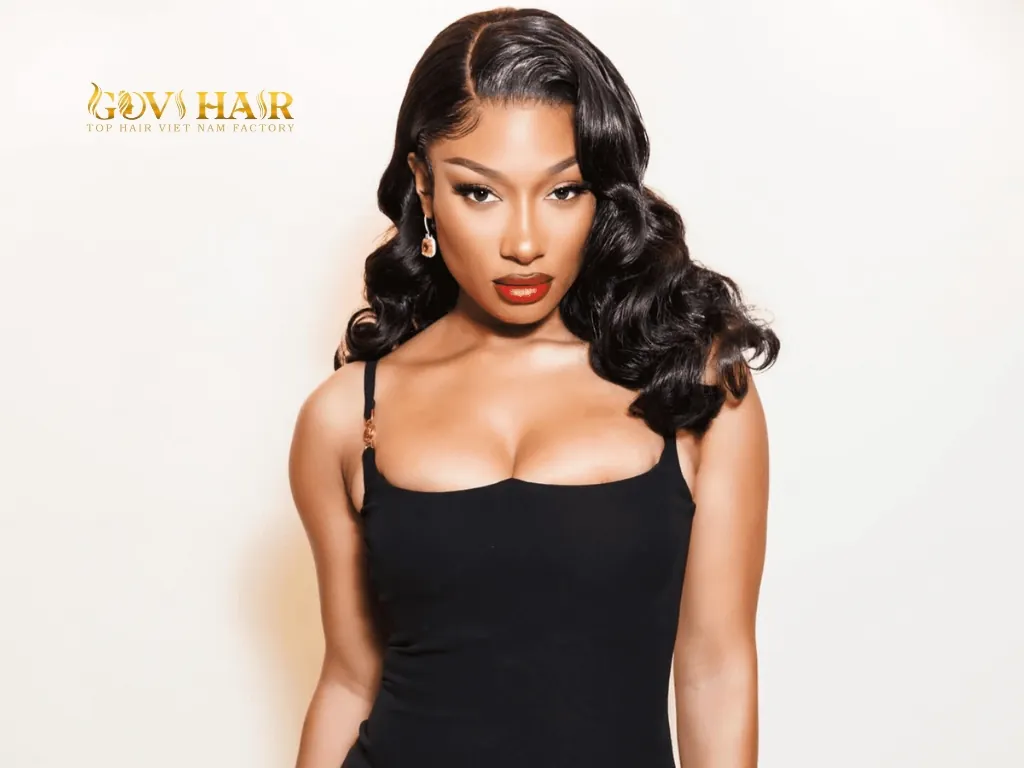 Cool-toned platinum drop effortlessly over her shoulders