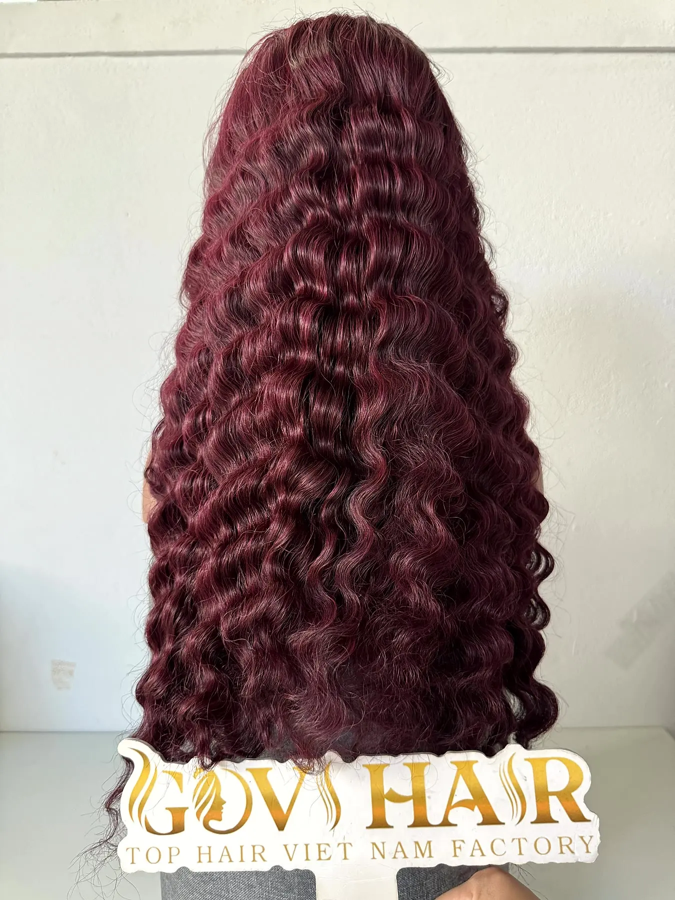 Burgundy human hair wig curls back view