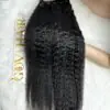 Kinky straight bundles 24 inch held by hand