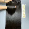 raw hair bundles held by hand showing shine