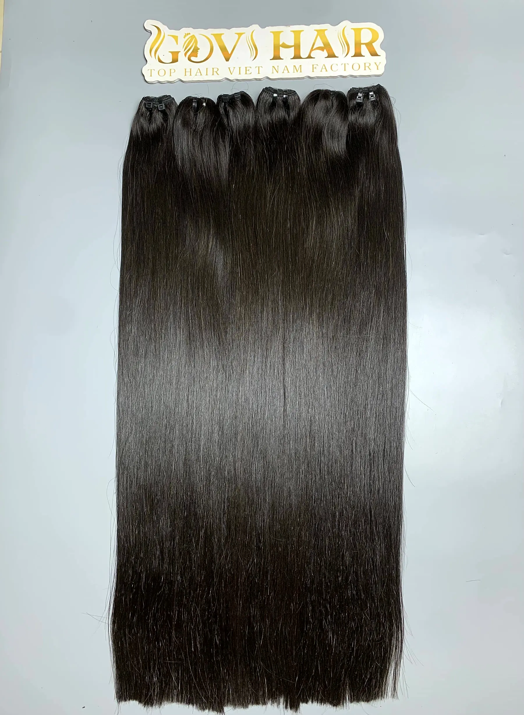 28 Inch Raw Human Hair Bundles Bone Straight Natural Black Wholesale 2 raw hair bundles close up view 2