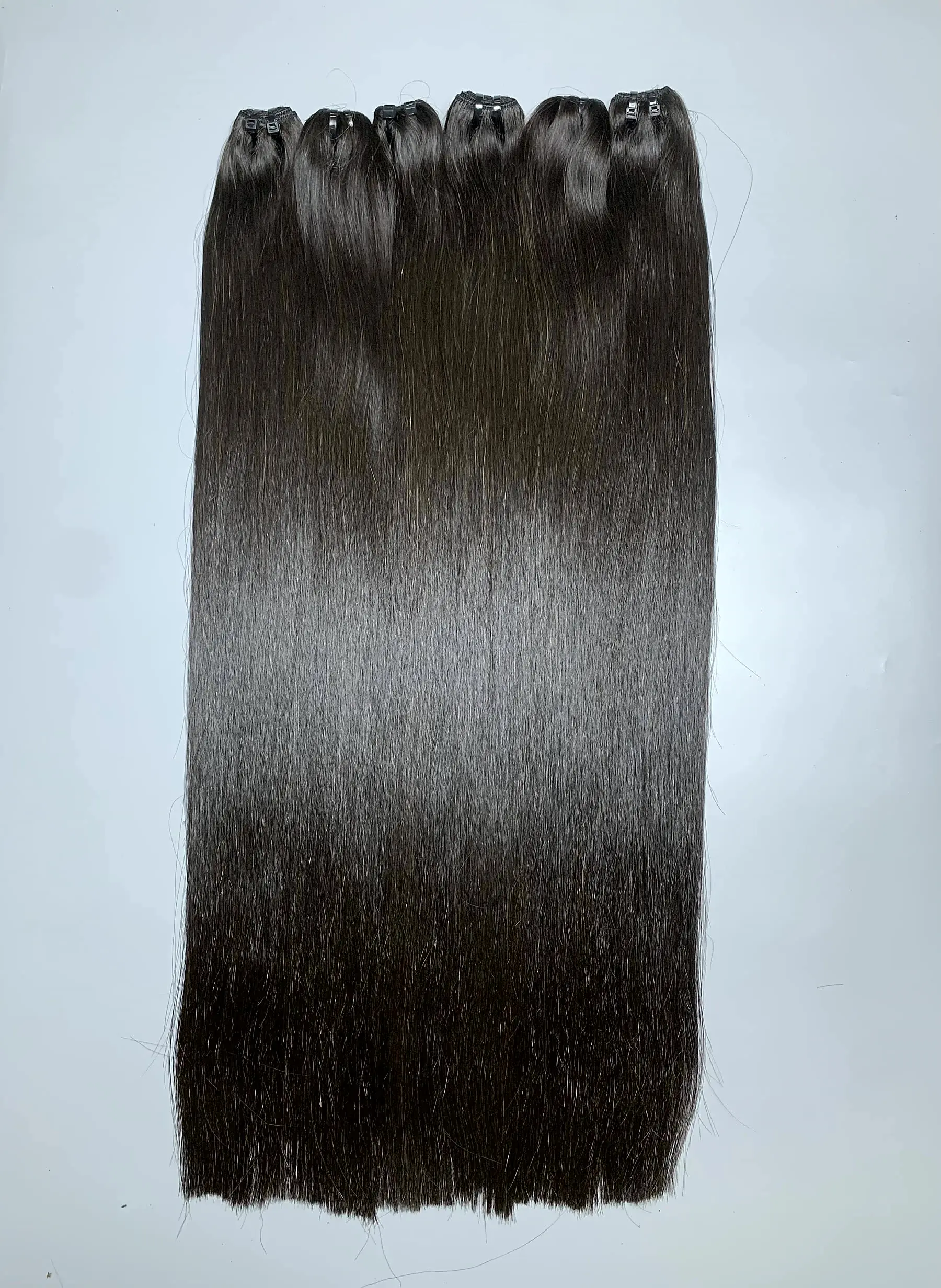 28 Inch Raw Human Hair Bundles Bone Straight Natural Black Wholesale 3 raw hair bundles close up view 3