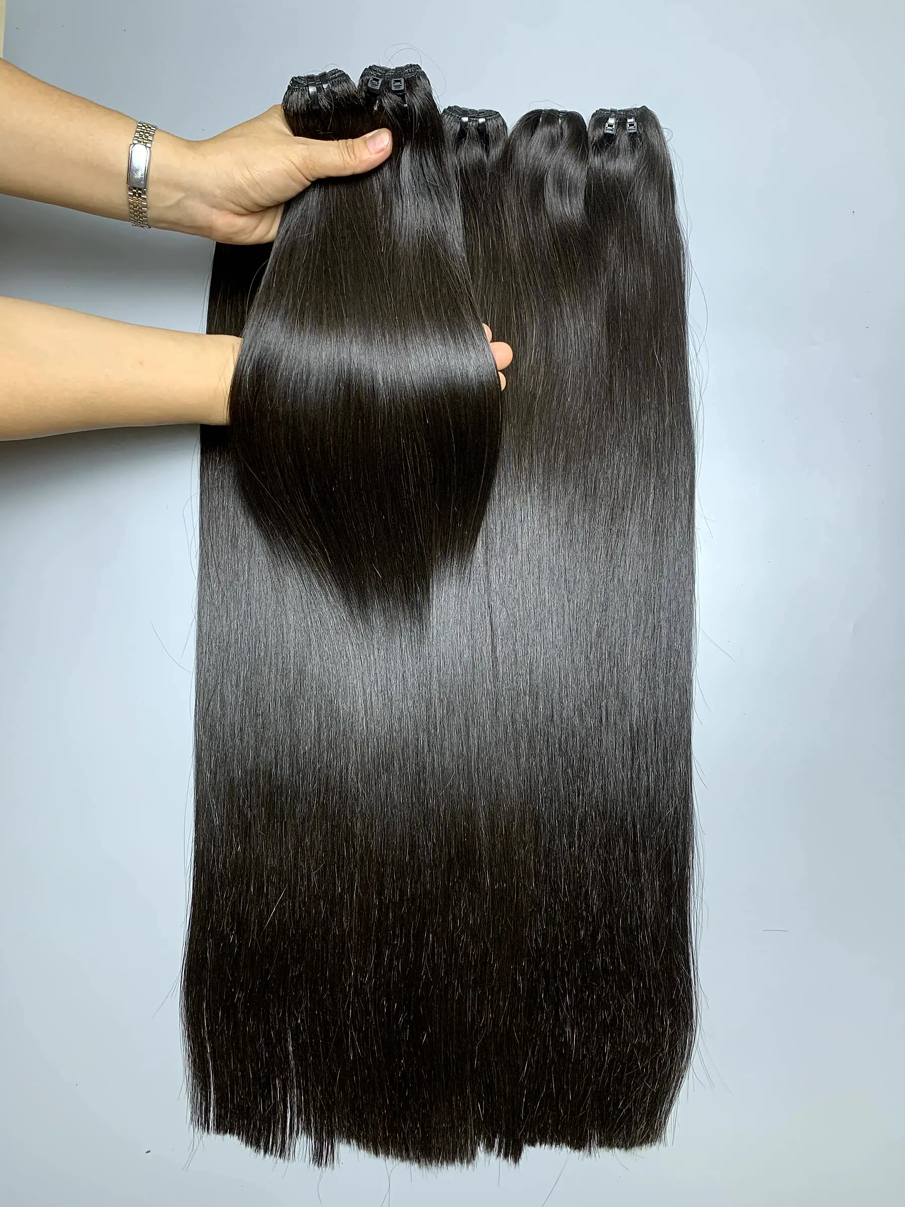 28 Inch Raw Human Hair Bundles Bone Straight Natural Black Wholesale 4 raw hair bundles close up view 4