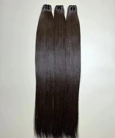 raw hair bundles in natural brown close up view 3