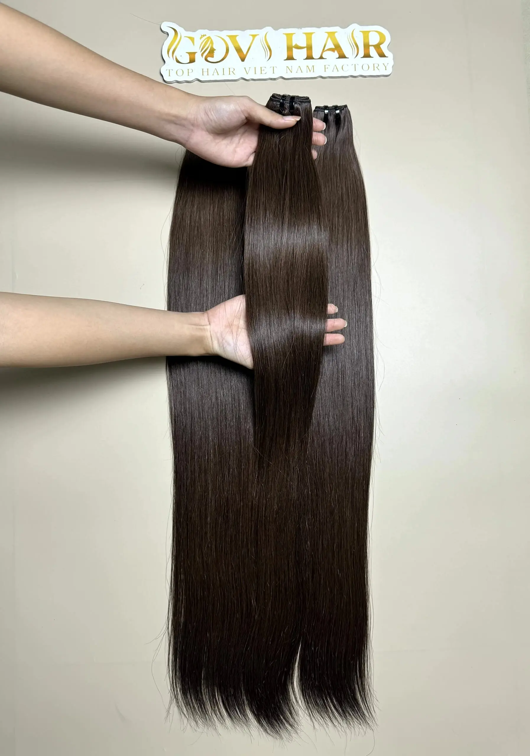 raw hair bundles in natural brown close up view 4