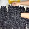 24 Inch Raw Burmese Curly Hair Bundles Double Drawn Wholesale 12 Raw Burmese curly hair 24 inch held by hand