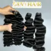 20 Inch Raw Human Hair Bundles Deep Curly and Natural Wave Wholesale 8 raw hair bundles with deep curly and natural wave held by hand showing shine