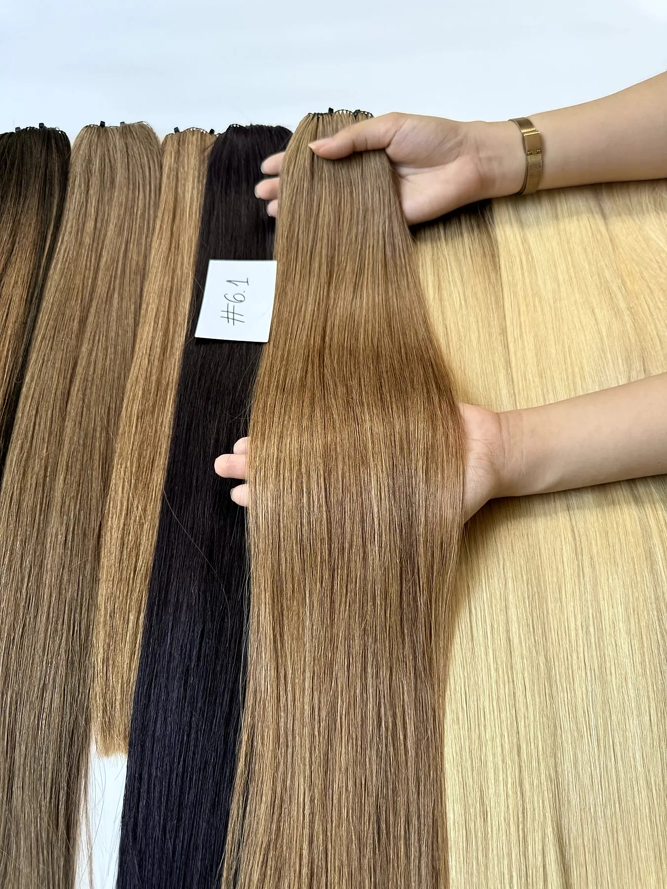 Light brown hair extensions #6.1 feather weft