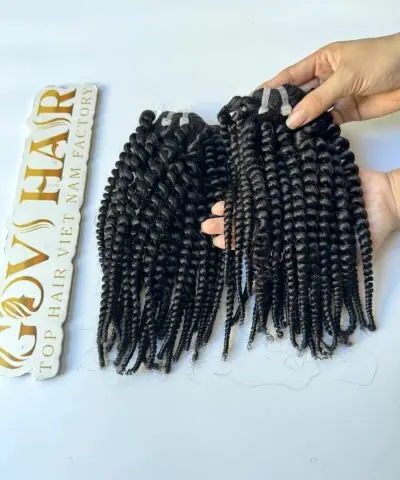 Spring curl hair extensions with Govihair logo