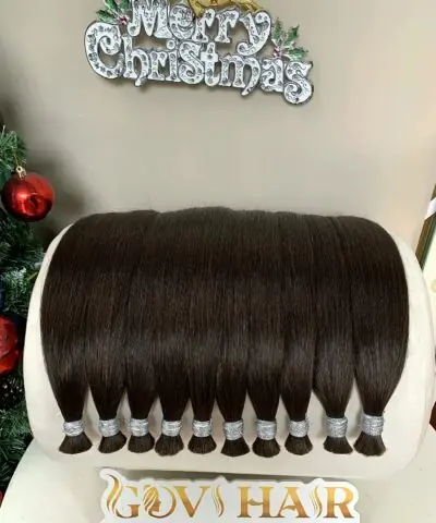Human hair bulk #2C laid on stand