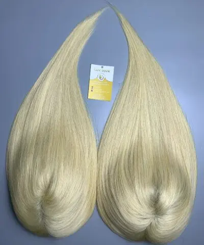 Two 14 inch blonde human hair toppers