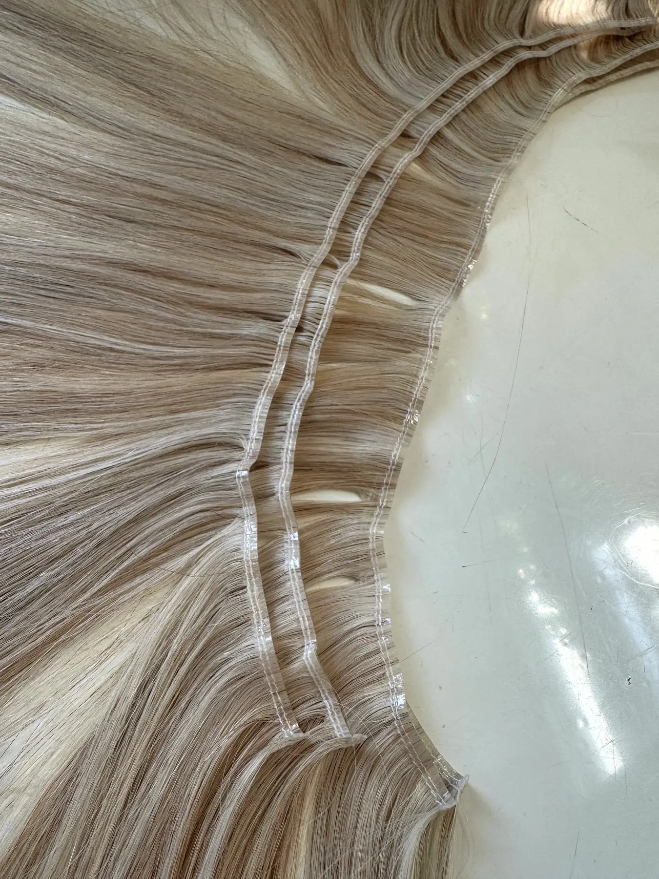 Invisible genius weft highlight close up band